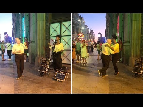 Old Man Dances With Busker