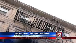 Building under orders; owner has long history of violations