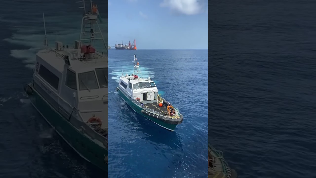 Surfer Boat Alongside | 