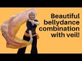 Belly dance combination with veil.