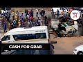 WATCH | Fast cash: Bystanders rush cash heist scene to grab leftover loot