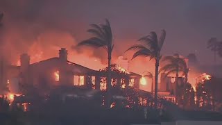 California fire destroys mansions