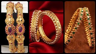 Latest & Stunning 2020 Designer 22k Gold Bangles Designs Ruby Emerald Bangles In Gold