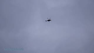 Police helicopter circling over the city in Hengelo