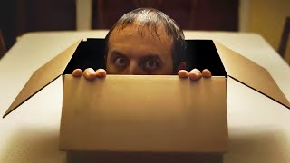 #movie Man opens box to reveal a human head sticking out ......