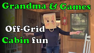 Grandma and Games at our Off Grid Cabin.