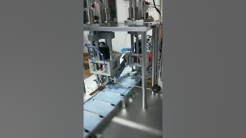 Automatic disposable three-layer mask machine