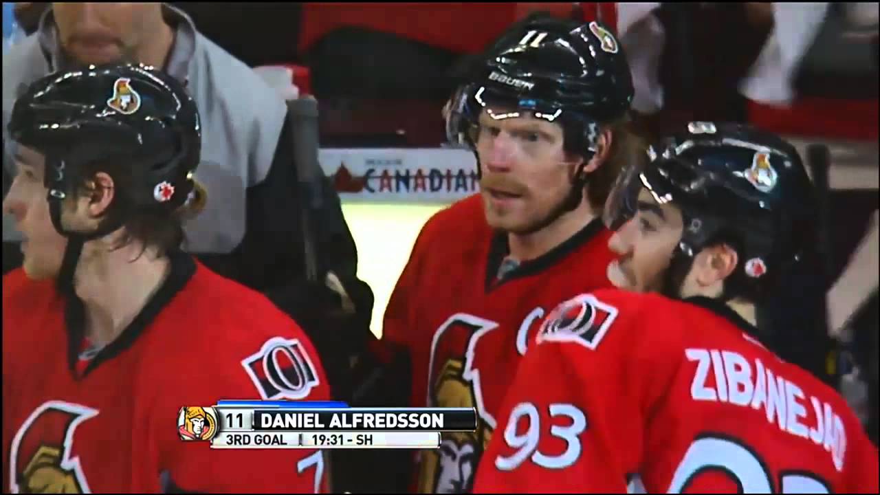 Ottawa Senators right wing Daniel Alfredsson loses his helmet and leaves  the game following a strong check by two Pittsburgh Penguins in the first  period of the Pens 8-2 win at Mellon