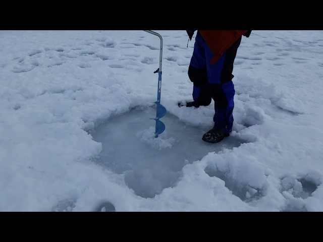 Drilling / Auger an Ice Fishing Hole #Shorts 