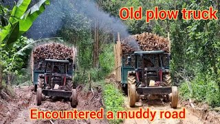 An old plow truck encountered a muddy road