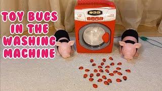 Toy Bugs in the washing machine by Happy Pigs