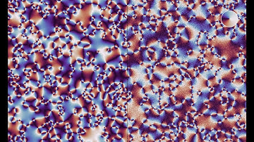 A Kuramoto model of coupled phase oscillators: Effect of noise on vorticity