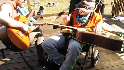 Jack and Shippee playing guitar