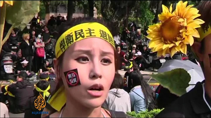 Thousands of Taiwanese protest China pact - DayDayNews