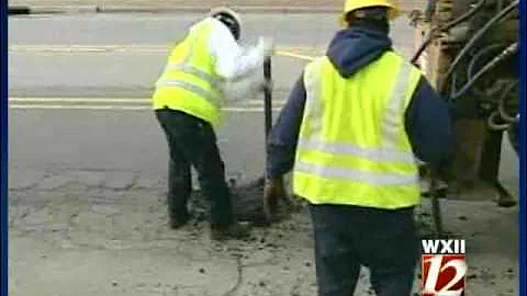 Crews Work To Fill Potholes