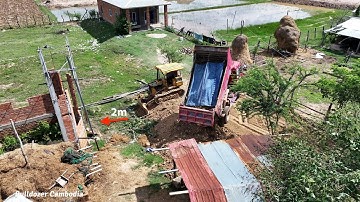 New project fully operational with the skills pushing soil filled in front of the villagers