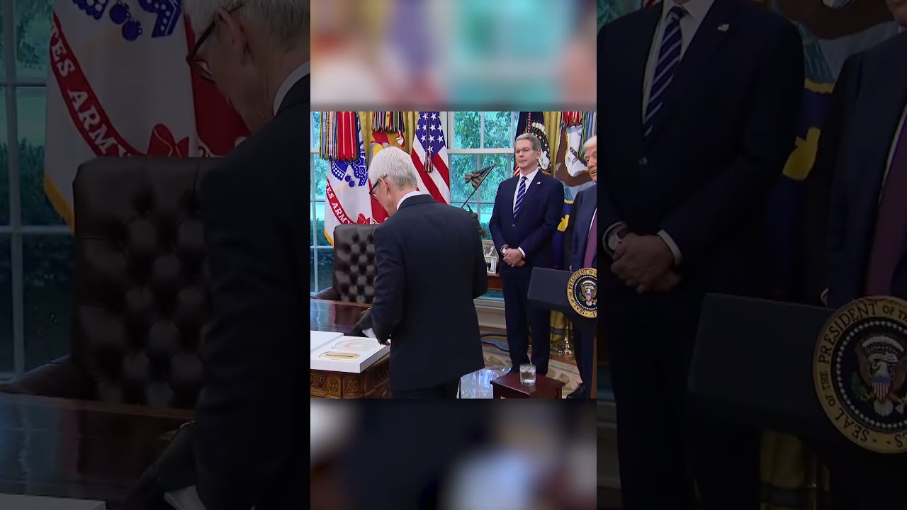 Apple CEO Tim Cook Gifts Trump Glass Plaque With 24 Carat Gold Base