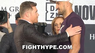 CANELO STARES DOWN KOVALEV, SIZES HIM UP, & SMACKS HIS ARMS AT FIRST FACE OFF; SIZE DIFFERENCE