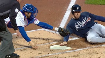 ATL@NYM: Markakis scores Freeman on overturned call