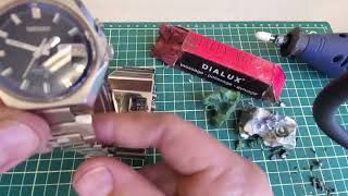 How to polish scratches out of a Stainless Steel watch using a dremel.