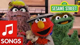 sesame street elmo is a reuse grouch with oscar earth day reusing song