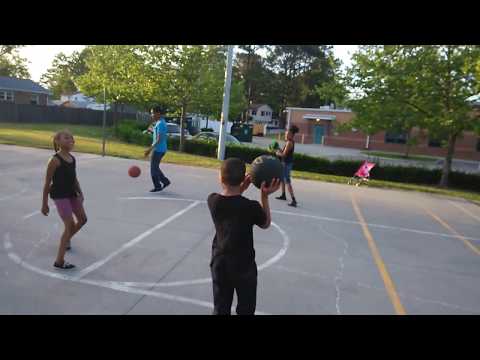 Some of the Fisher kids with me @ the basketball court @ Malibu Elementary School