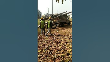 electric pole unload at site||electric pole dumping|electric pole unloading