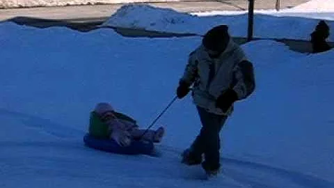 Maddie's first sled ride