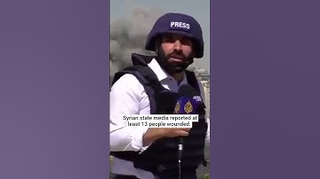 Thumbnail of Israel attack on Syrian military HQ captured during live TV report