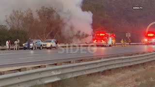 Sig Alert issued after fiery crash ignites nearby brush