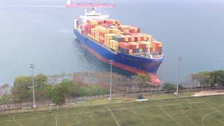 A container ship crashes into a football field