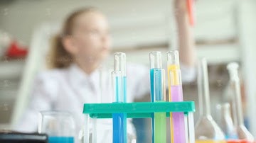 Test tubes with colored chemical reagents. Chemical flasks