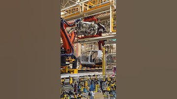 Automated automotive production line using multiple kuka robots.