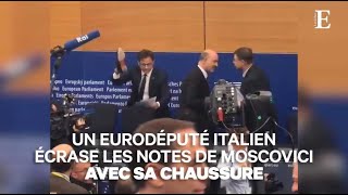 Budget italien rejeté : un eurodéputé écrase les notes de Moscovici avec sa chaussure