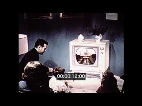 1960s-family-watching-colour-tv,-usa
