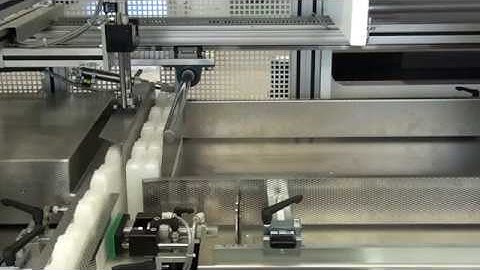 Hugo Beck - Grouping and shrink wrapping of plastic containers