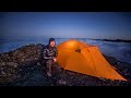 Freezing mountain camping above the clouds