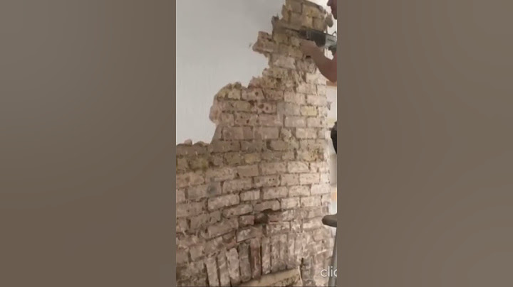 Plaster removal and brick pointing
