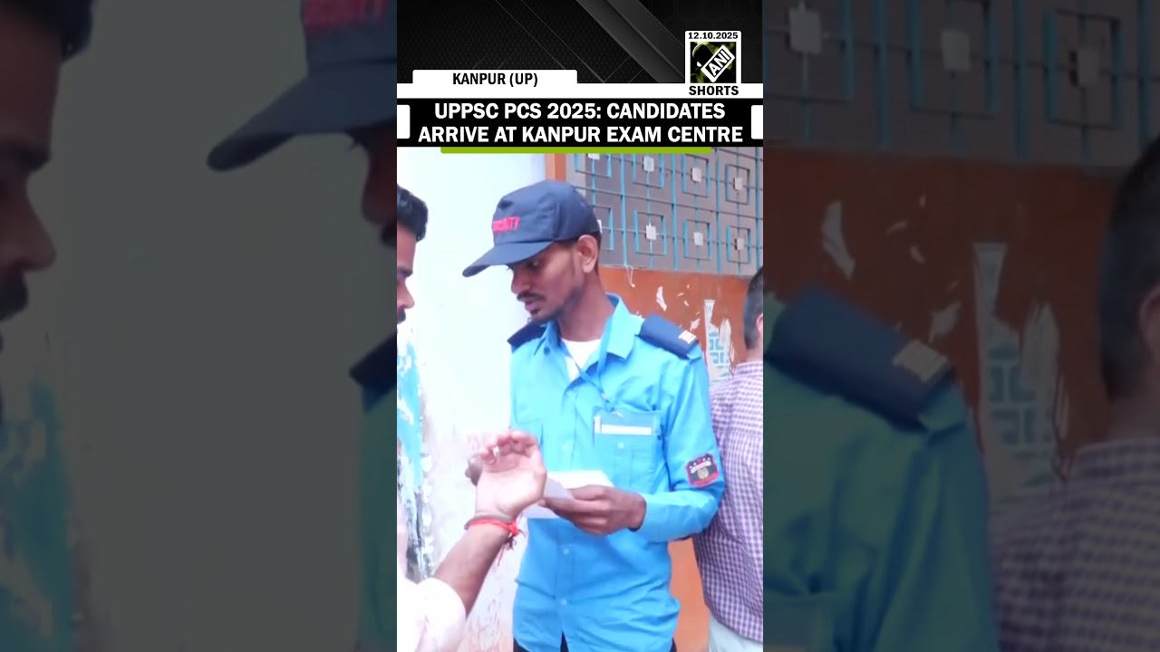 UP: Candidates line up outside UPPSC PCS Prelims Examination centre in Kanpur