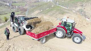 We are building roads with 2 tractors + construction equipment!