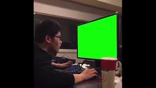 Guy punching monitor green screen
