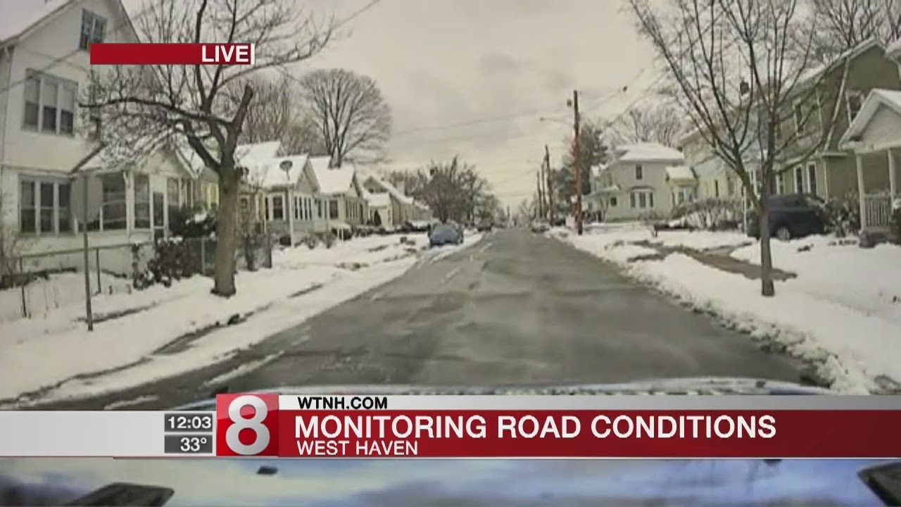 Spring snow causes slick road conditions Monday - YouTube