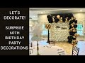 Black and gold surprise 60th birt.ay party decorations