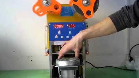 máy dập nắp cốc nhựa, máy dán miệng ly trà sữa, ly nước mía, ly bắp rang bơ tự động