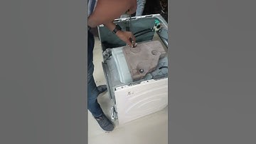 front loading washing machine assembling by student in mechanical course class. call 9540 239 239