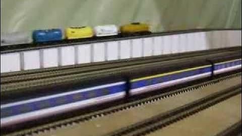 N-Gauge model railway in loft - first incline added leading to a steep embankment!! Class 33 & 47