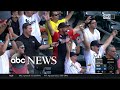 Father stops mid-interview to celebrate after son hits MLB home run