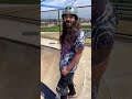 One armed skater teaches blind skater how to ride a bowl