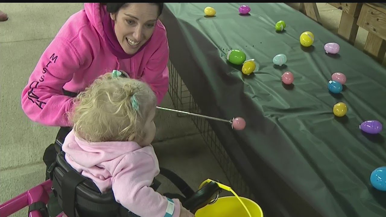 Inclusive egg hunt adapts for kids with special needs - YouTube