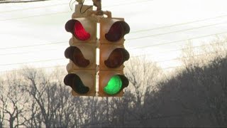 Is it legal to run a red light so an ambulance can pass?